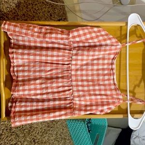 Orange and white tank plade